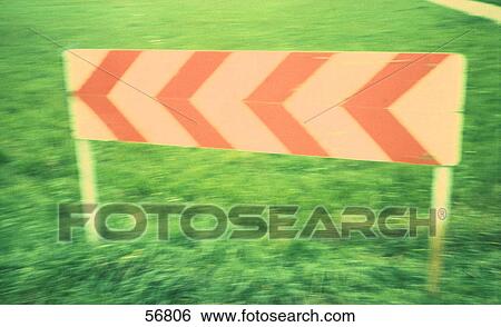 Close-up of arrow sign View Large Photo Image Stock Photograph - Close-up of arrow sign . Fotosearch