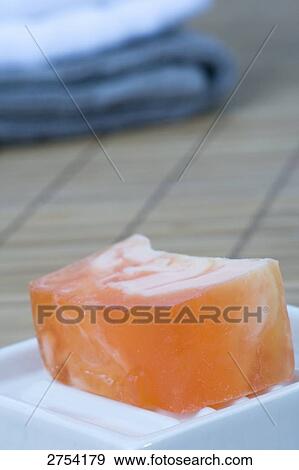 Stock Photo - Close-up of bar of soap in soap dish . Fotosearch