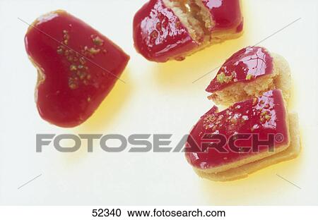 Close-up of broken heart shaped bread View Large Photo Image Stock Image - Close-up of broken heart shaped bread . Fotosearch