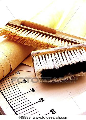 Close-up of brushes and roll of wallpaper View Large Photo Image Stock Image - Close-up of brushes and roll of wallpaper . Fotosearch