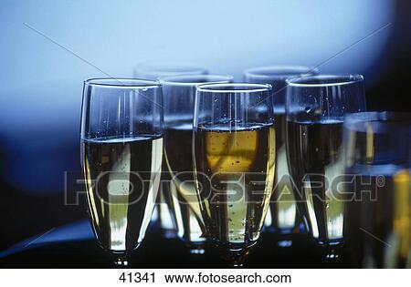 Close-up of champagne flutes View Large Photo Image Stock Image - Close-up of champagne flutes . Fotosearch