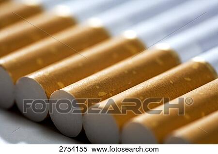 Stock Photography - Close-up of cigarettes in row . Fotosearch