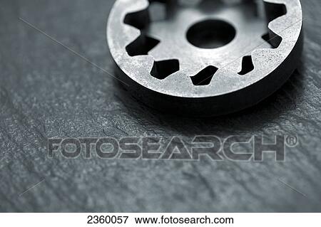 Close-up of cog wheel View Large Photo Image Stock Photo - Close-up of cog wheel . Fotosearch
