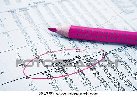 Stock Photo - Close-up of colored pencil on newspaper . Fotosearch