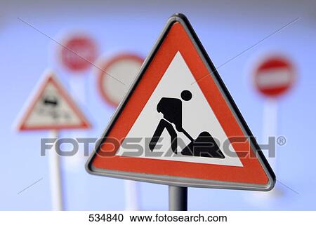 Stock Image - Close-up of construction worker sign . Fotosearch