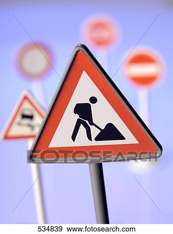 Stock Photo - Close-up of construction worker sign . Fotosearch