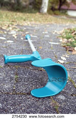Stock Image - Close-up of crutch on road . Fotosearch