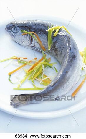 Picture - Close-up of dead trout on plate . Fotosearch