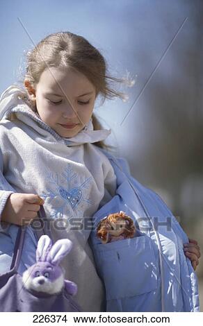 Close-up of girl with puppets View Large Photo Image Picture - Close-up of girl with puppets . Fotosearch