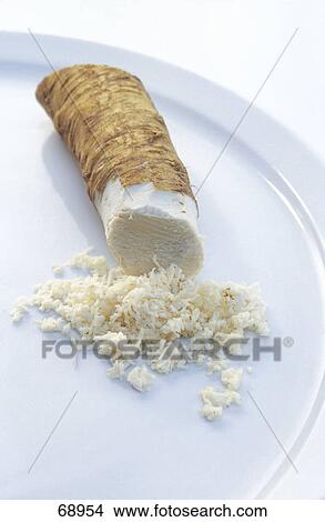 Picture - Close-up of grated radish on plate . Fotosearch