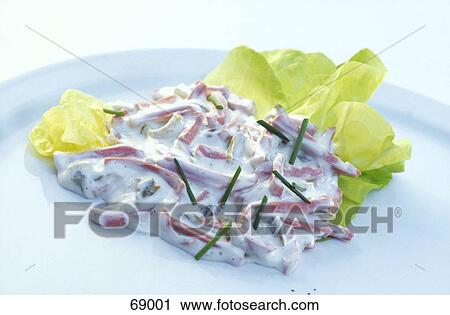 Stock Image - Close-up of green salad on plate . Fotosearch