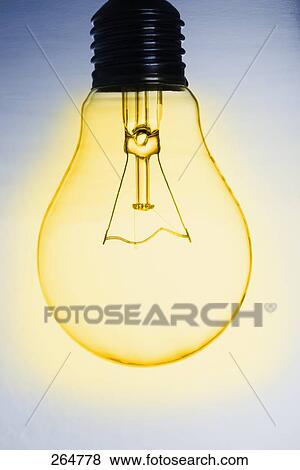 Stock Photo - Close-up of light bulb . Fotosearch