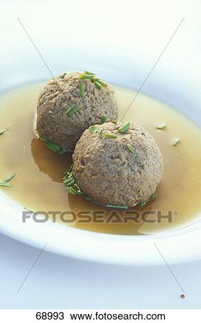 Close-up of liver dumplings in gravy View Large Photo Image Stock Image - Close-up of liver dumplings in gravy . Fotosearch