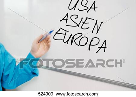 Stock Photo - Close-up of man's hand pointing towards whiteboard . Fotosearch