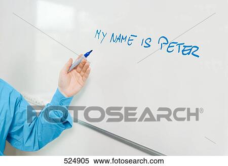 Stock Photography - Close-up of man's hand pointing towards whiteboard . Fotosearch