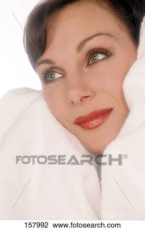 Close-up of mid adult woman with towel View Large Photo Image Stock Image - Close-up of mid adult woman with towel . Fotosearch