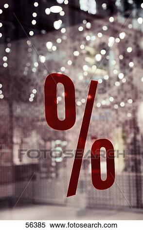 Stock Photography - Close-up of percentage sign on window glass . Fotosearch