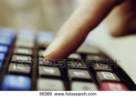 Close-up of person's finger dialing landline phone View Large Photo Image Stock Photo - Close-up of person's finger dialing landline phone . Fotosearch
