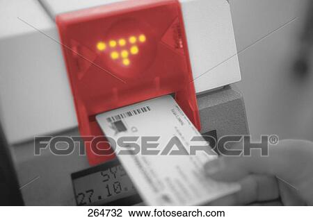 Close-up of person's hand inserting card View Large Photo Image Stock Image - Close-up of person's hand inserting card . Fotosearch