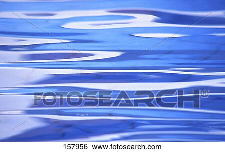 Stock Photograph - Close-up of ripples on water surface . Fotosearch