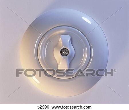 Stock Image - Close-up of rotary electric switch . Fotosearch