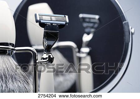 Picture - Close-up of shaving brush and razor . Fotosearch