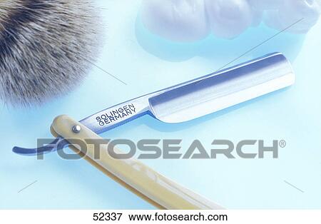 Stock Photo - Close-up of shaving brush and razor . Fotosearch