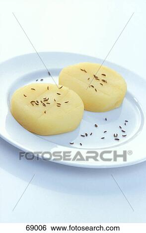 Close-up of slices of cheese on plate View Large Photo Image Stock Photograph - Close-up of slices of cheese on plate . Fotosearch