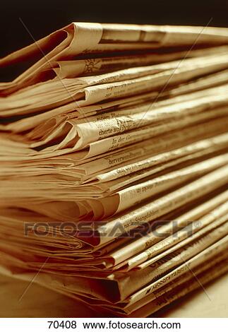 Close-up of stack of newspapers View Large Photo Image Stock Photo - Close-up of stack of newspapers . Fotosearch
