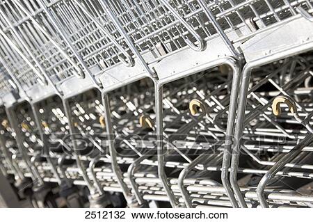 Close-up of supermarket shopping trolleys in row View Large Photo Image Stock Image - Close-up of supermarket shopping trolleys in row . Fotosearch