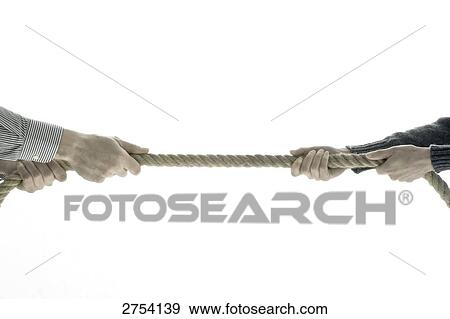 Close-up of two men pulling rope  View Large Photo Image Stock Photo - Close-up of two men pulling rope . Fotosearch