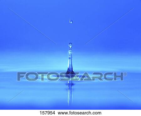 Close-up of water droplet creating ripples View Large Photo Image Picture - Close-up of water droplet creating ripples . Fotosearch