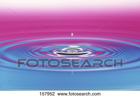 Close-up of water droplet creating ripples View Large Photo Image Stock Image - Close-up of water droplet creating ripples . Fotosearch