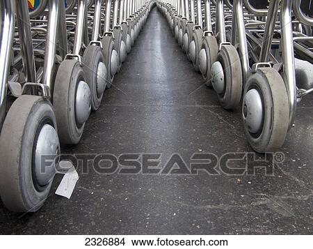 Close-up of wheels of luggage carts View Large Photo Image Picture - Close-up of wheels of luggage carts . Fotosearch