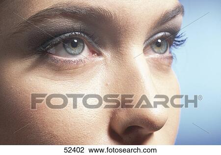 Close-up of young woman's eyes View Large Photo Image Stock Image - Close-up of young woman's eyes . Fotosearch