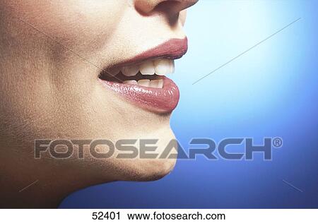 Close-up of young woman's lips View Large Photo Image Stock Image - Close-up of young woman's lips . Fotosearch