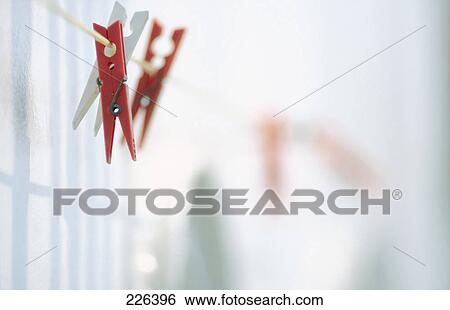 Clothespins on clothesline View Large Photo Image Stock Photograph - Clothespins on clothesline . Fotosearch