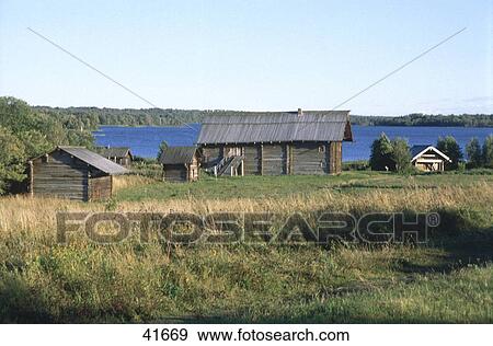 Stock Photo - Cottages in field, Kizhi Island, Russia . Fotosearch