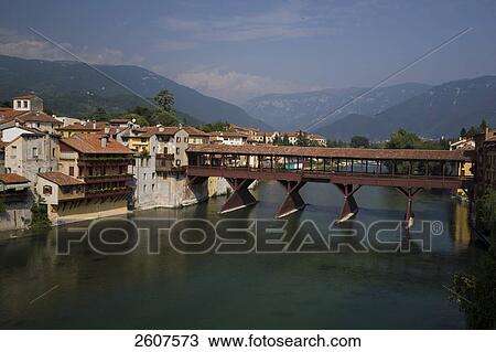 Covered bridge across river, Italy View Large Photo Image Stock Image - Covered bridge across river, Italy . Fotosearch
