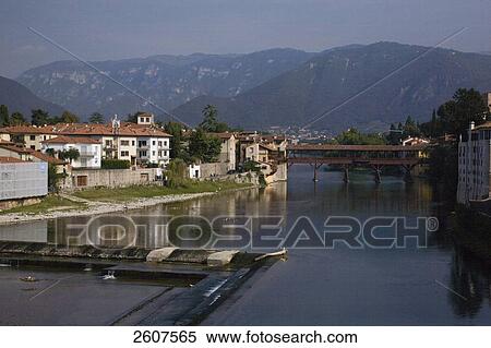 Covered bridge across river, Italy View Large Photo Image Stock Photography - Covered bridge across river, Italy . Fotosearch