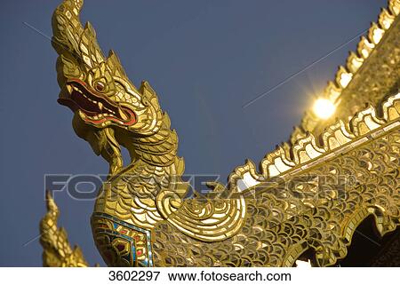 Dragon figure at the roof of the Temple Wat Phra Singh, Chiang Mai, Thailand, detail View Large Photo Image Stock Photo - Dragon figure at the roof of the Temple Wat Phra Singh, Chiang Mai, Thailand, detail . Fotosearch