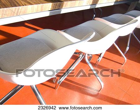Empty chairs and table at conference room View Large Photo Image Stock Image - Empty chairs and table at conference room . Fotosearch
