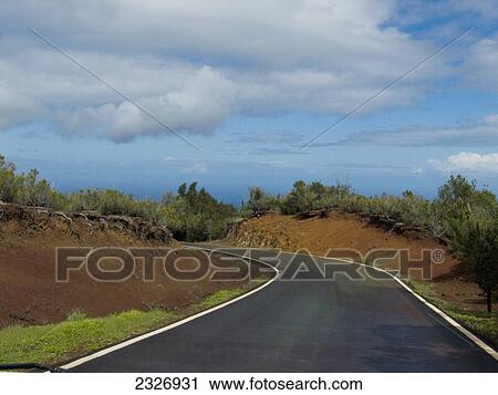Empty road running through landscape, La Gomera, Canary Islands, Spain View Large Photo Image Stock Image - Empty road running through landscape, La Gomera, Canary Islands, Spain . Fotosearch