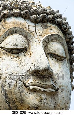 Face of a Buddha statue in Thailand View Large Photo Image Stock Photo - Face of a Buddha statue in Thailand . Fotosearch