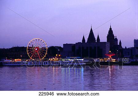 Stock Photograph - Fairground lit up at night, Theodor Heuss Bridge, Mainz, Rhineland-Palatinate, Germany . Fotosearch