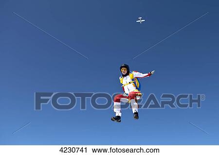 Female parachute jumper, Illertissen, Bavaria, Germany, Europe View Large Photo Image Stock Image - Female parachute jumper, Illertissen, Bavaria, Germany, Europe . Fotosearch