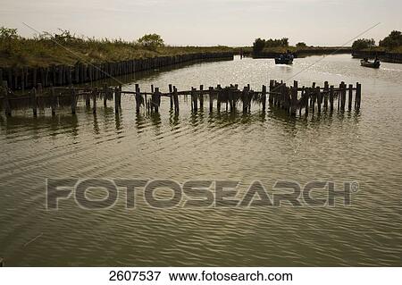 Stock Photo - Fish traps in river, Valli Di Comacchio, Emilia-Romagna, Italy . Fotosearch