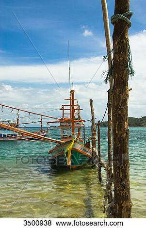 Stock Photo - Fishing boat on Ko Phangan, Thailand . Fotosearch