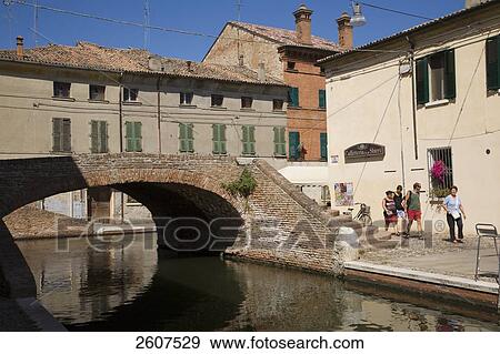 Stock Photo - Footbridge over canal, Comacchio, Emilia-Romagna, Italy . Fotosearch
