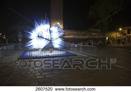 Glass sculpture lit up at night, Murano Isola di Murano, Veneto, Venice, Italy View Large Photo Image Stock Image - Glass sculpture lit up at night, Murano Isola di Murano, Veneto, Venice, Italy . Fotosearch